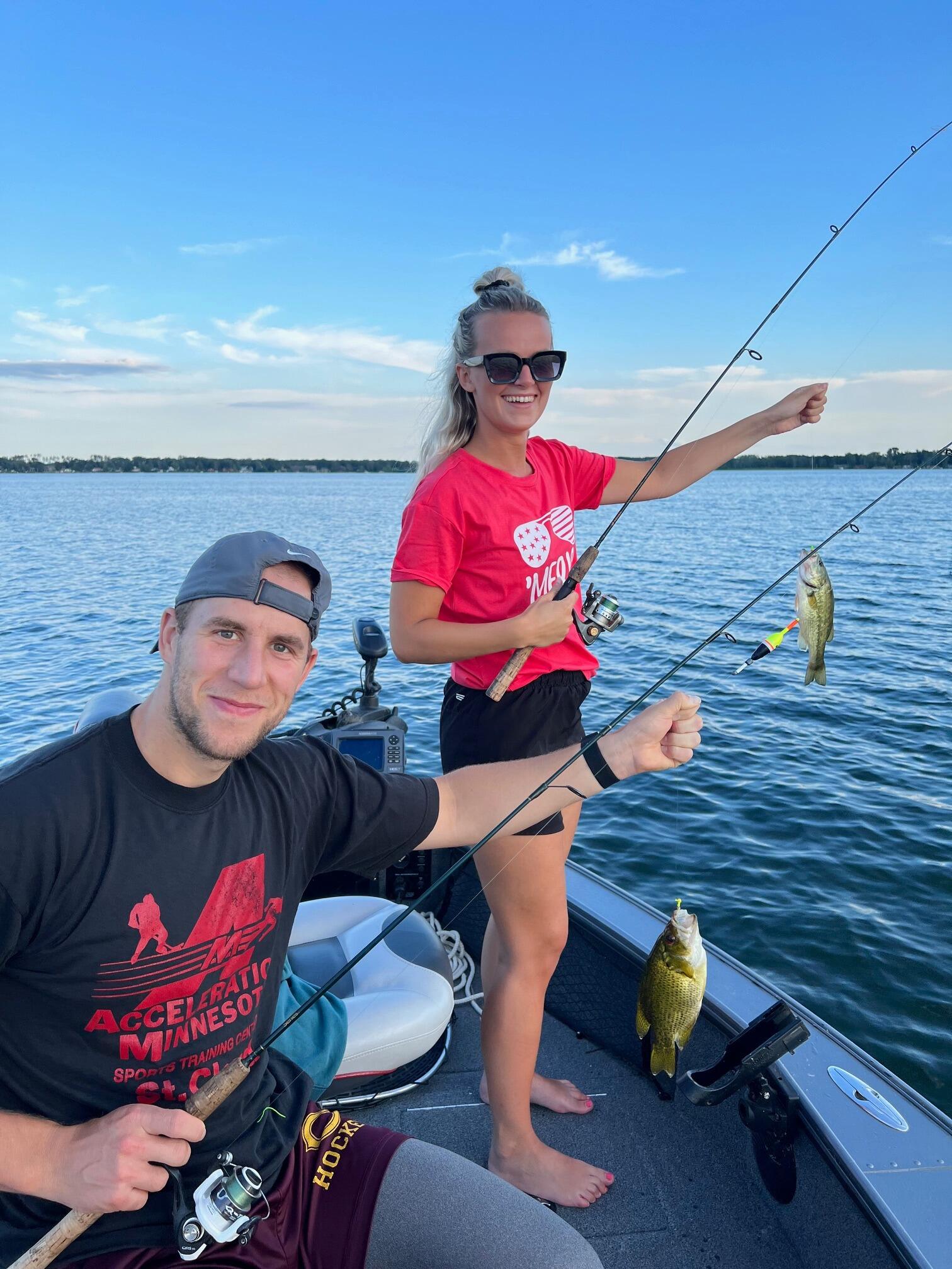 Fishing on North Long Lake. Showing Josse the American way! (**Josse had to take off Alex's fish.."allegedly")