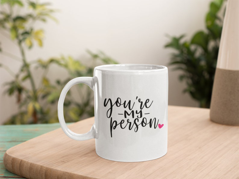 'you're my person' in black script with pink heart on white mug