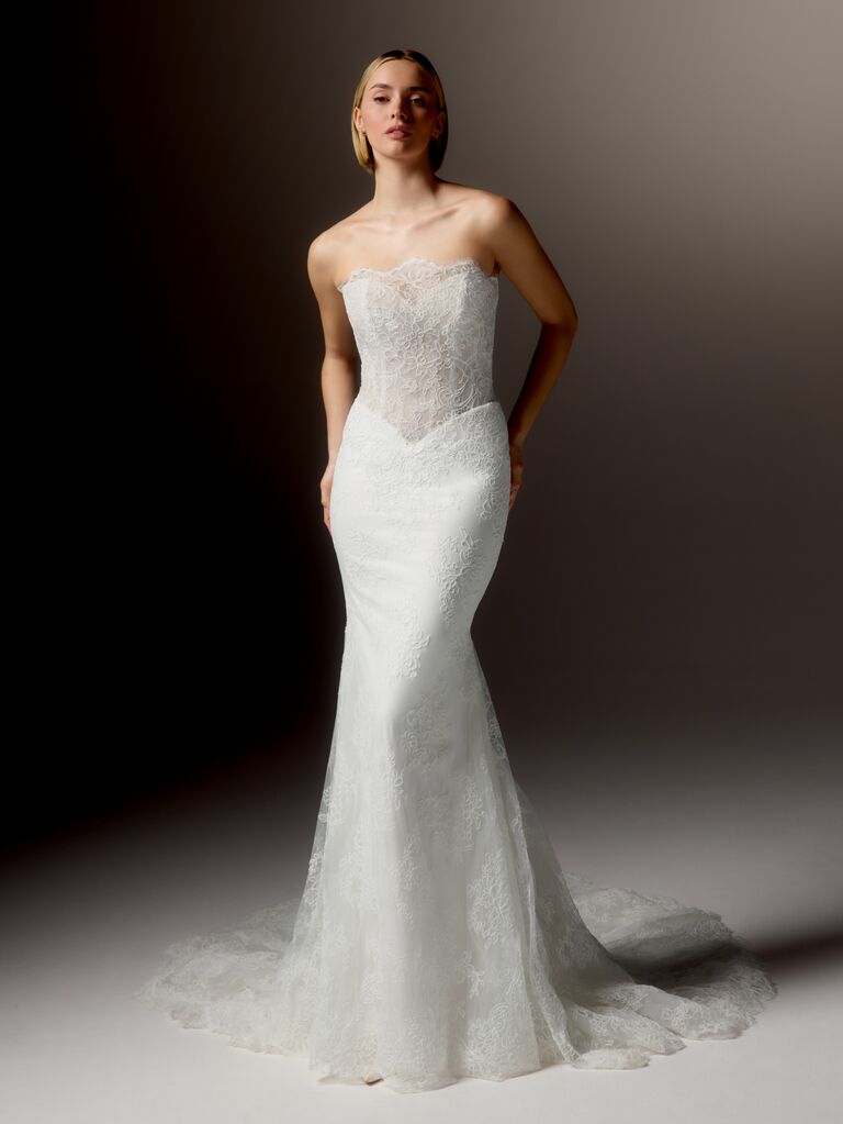 Strapless lace-lined wedding dress with basque waist and sheer bodice