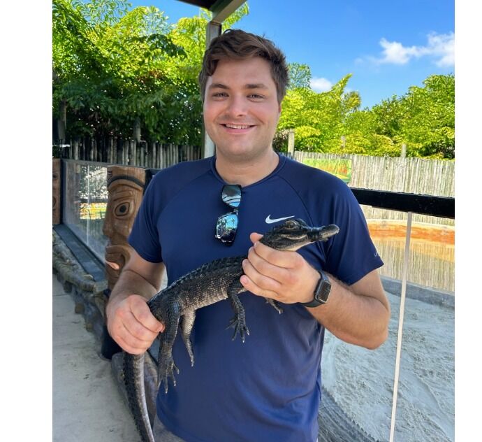 Kyle holding baby Gator at the Everglades