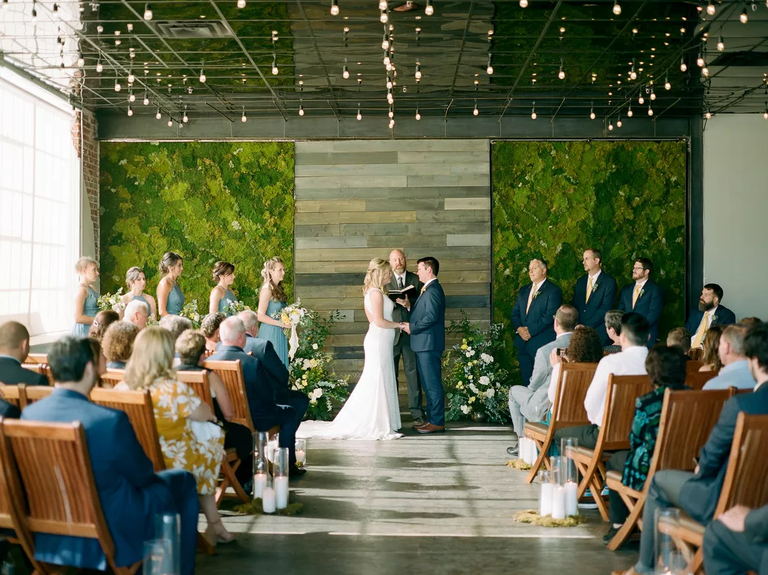 A modern indoor wedding ceremony space at Moss Denver in Denver, Colorado