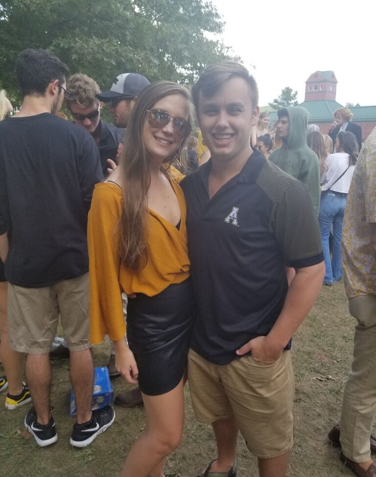 We graduated from Appalachian State University together (literally together, we walked the stage one after the other).  We enjoy returning to Boone to explore the town and attend App State football games. 
