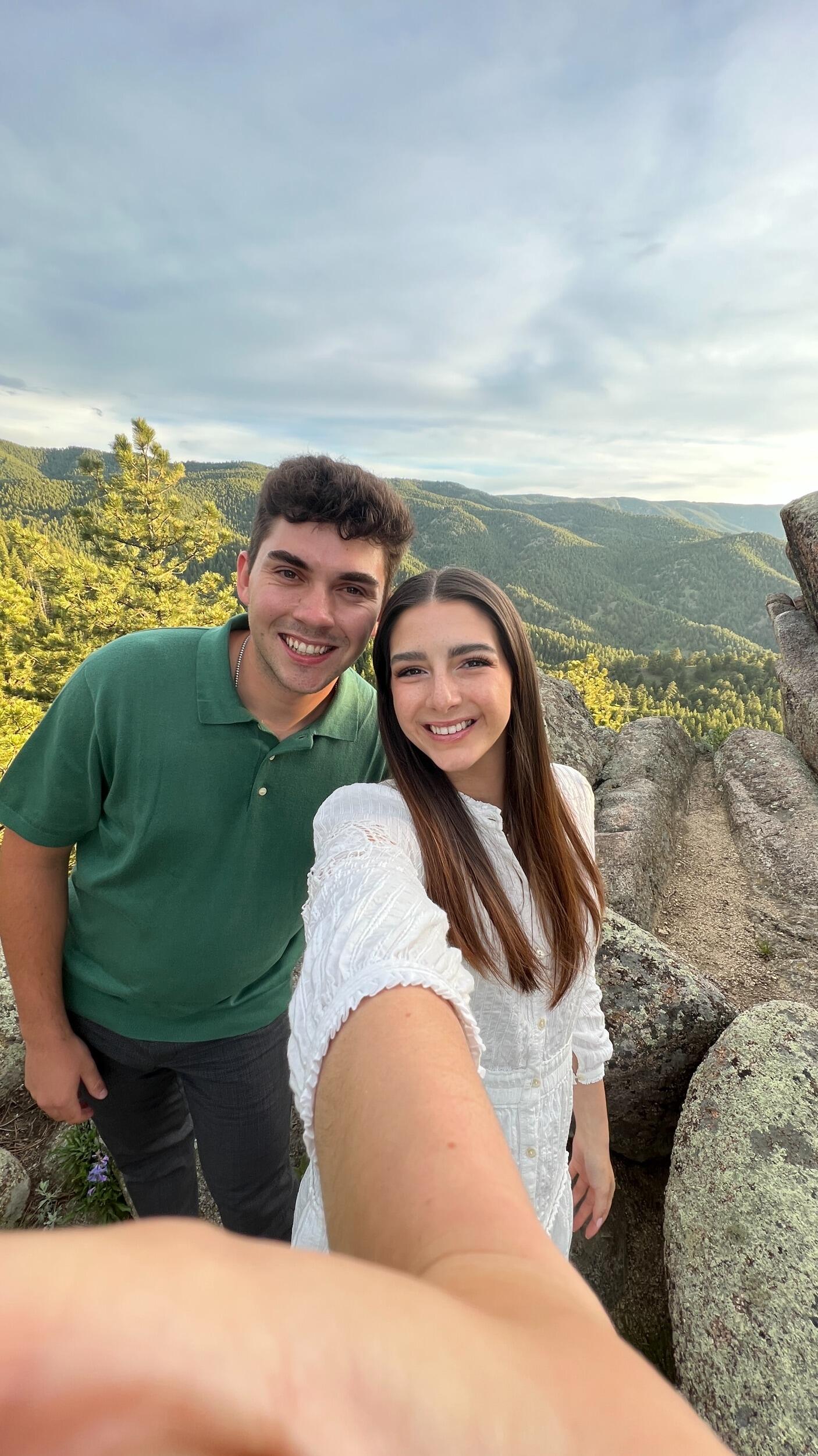 We decided to spend the rest of our week touring around the beautiful state of Colorado before driving back home. We did things like whitewater rafting, hiking, visiting America's highest-elevated amusement park, exploring caves, and more! Here we are after a nice dinner on our way to watch the sunset from a spectacular lookout point near Boulder. This also became the very last photo of us before getting engaged!