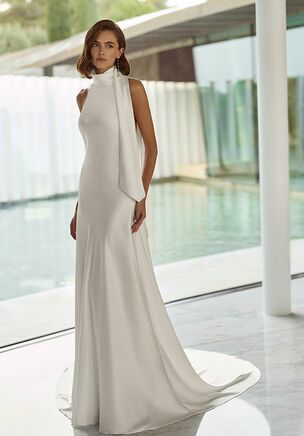 Straight silhouette wedding dress in textured satin with swan neckline, open back, smooth bodice finish and drape.