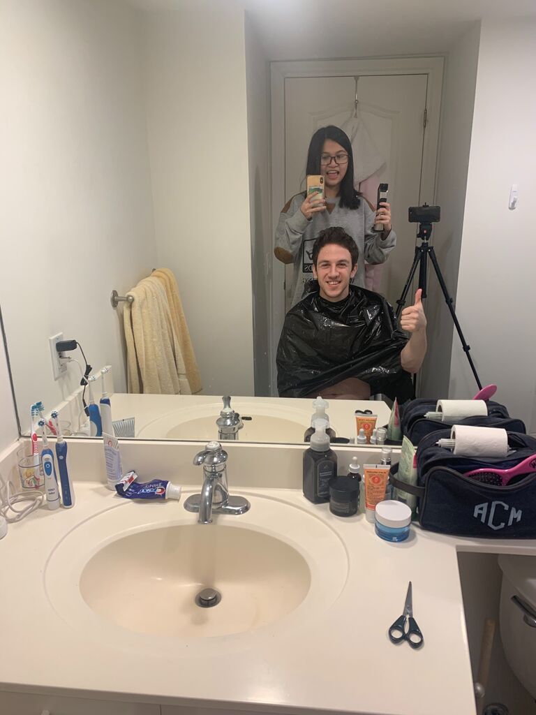 Then COVID-19 hit...We moved in together and now Adam had himself a personal hairdresser! 