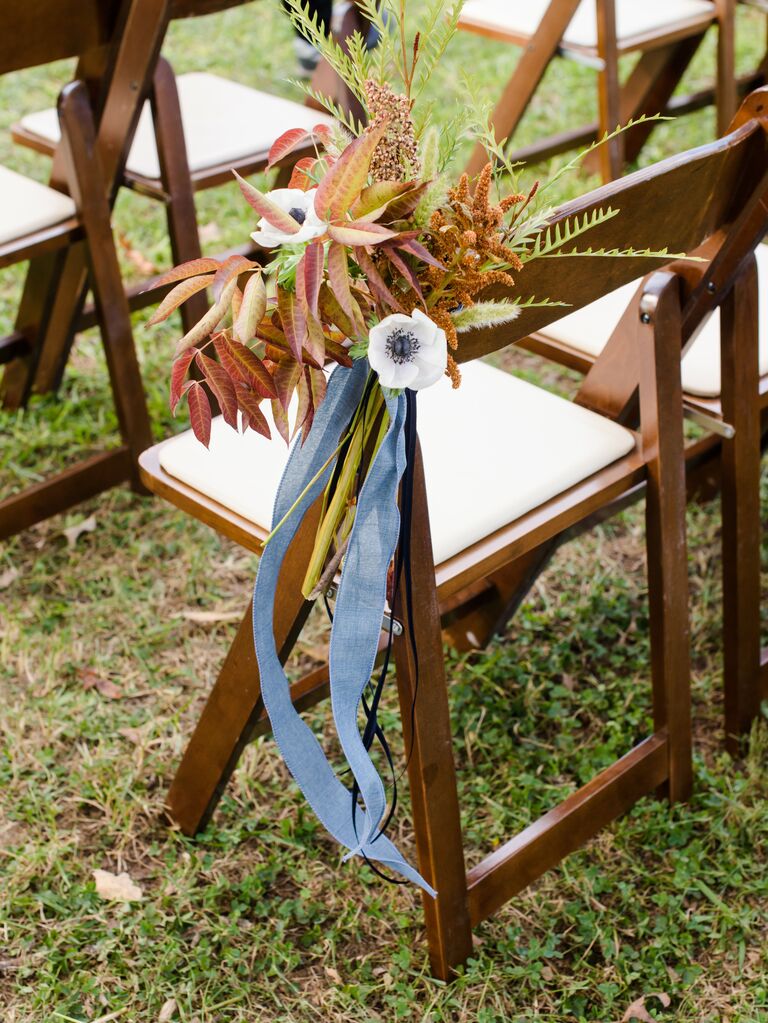 fall wedding aisle marker with autumn foliage and light blue raw silk ribbons