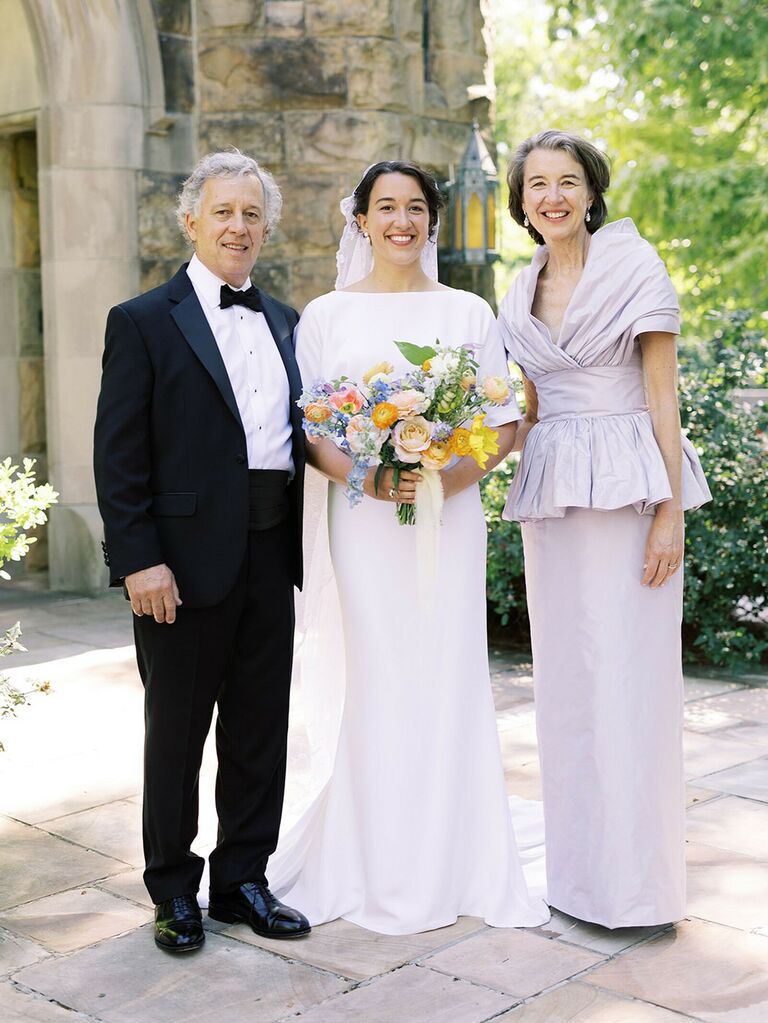 Father of the bride wears an elegant tuxedo. 