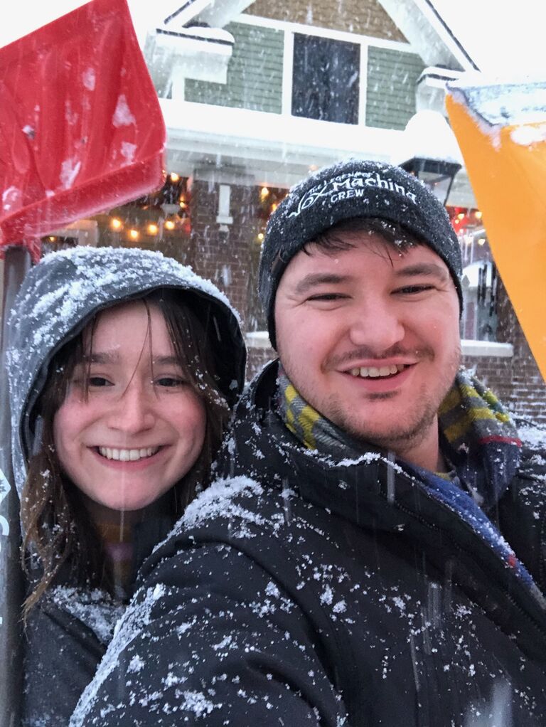 Shoveling snow during a blizzard at our new house!