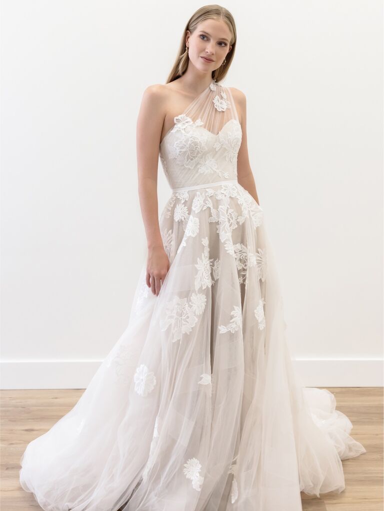 Floral applique wedding dress by Watters Designs. 
