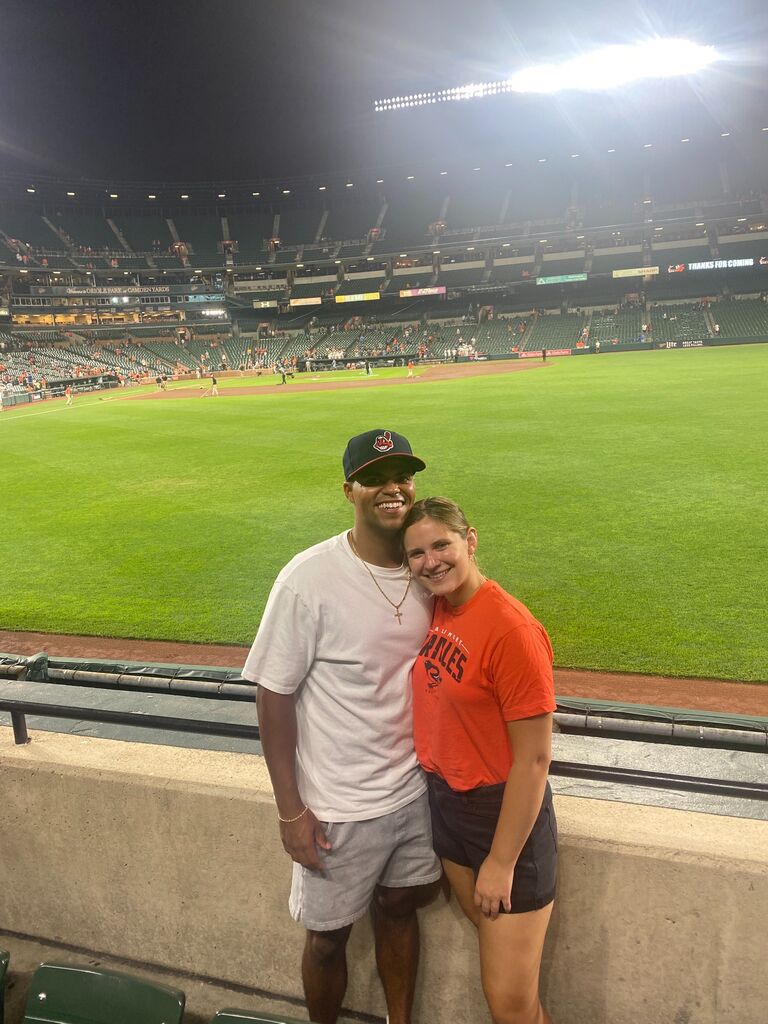 Deon and Olivia at an Oriole's game the first weekend in their new town, Baltimore.