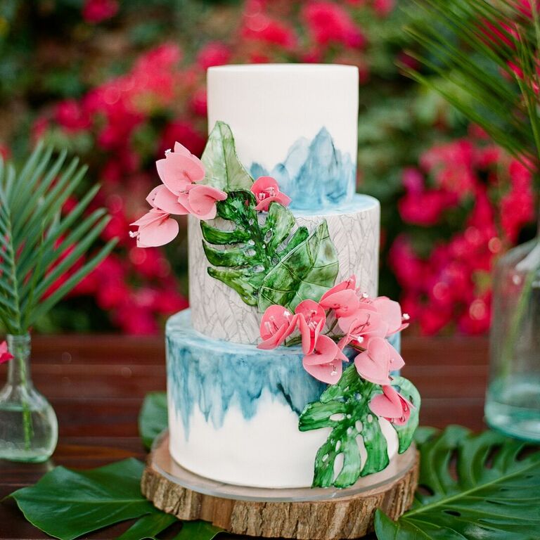 Tropical three-tier cake with painted decorations