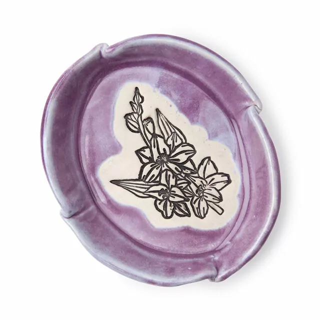 Purple ring dish with floral design