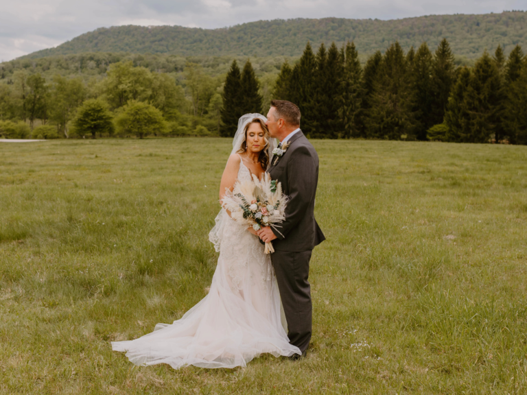 Bride and groom's wedding portraits in field in West Virginia, how to get married in West Virginia