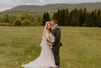 Bride and groom's wedding portraits in field in West Virginia, how to get married in West Virginia