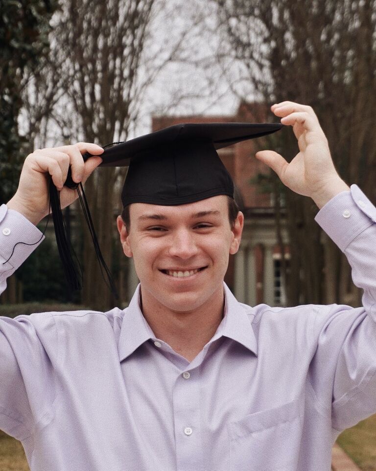 Chris graduates from GCSU.