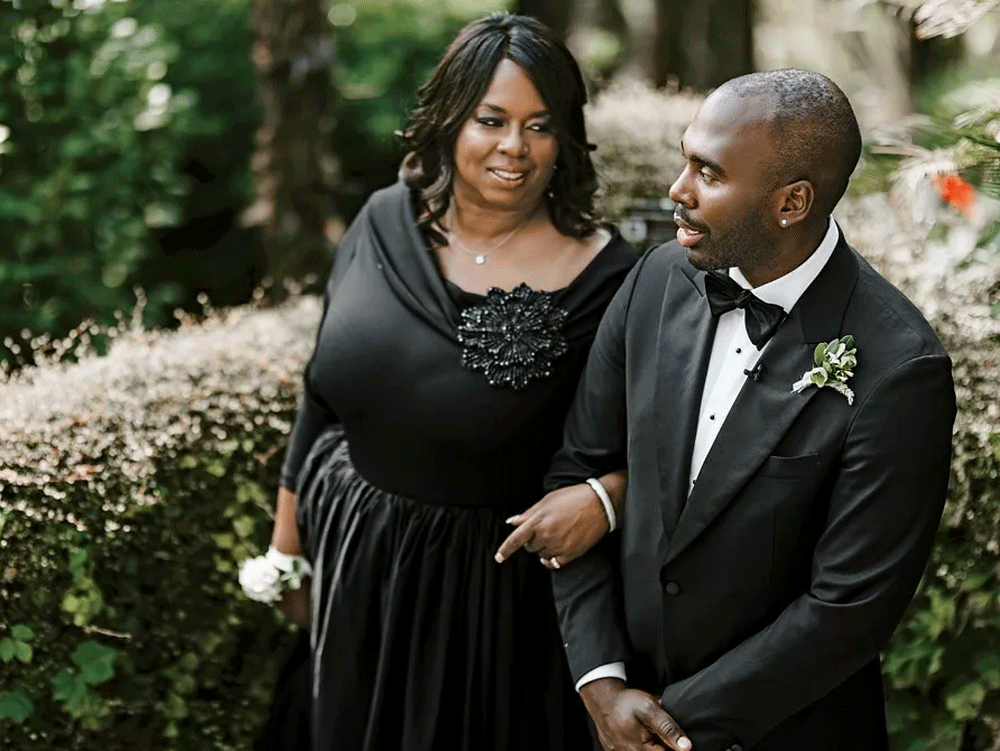 Groom and mother of the groom having a private moment before the ceremony.