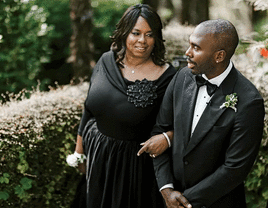 Groom and mother of the groom having a private moment before the ceremony.