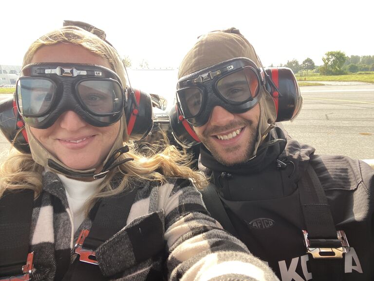 Kailey & Aaron sign up for a WWII open cockpit plane ride in Ottawa. The smiles didn't last long.