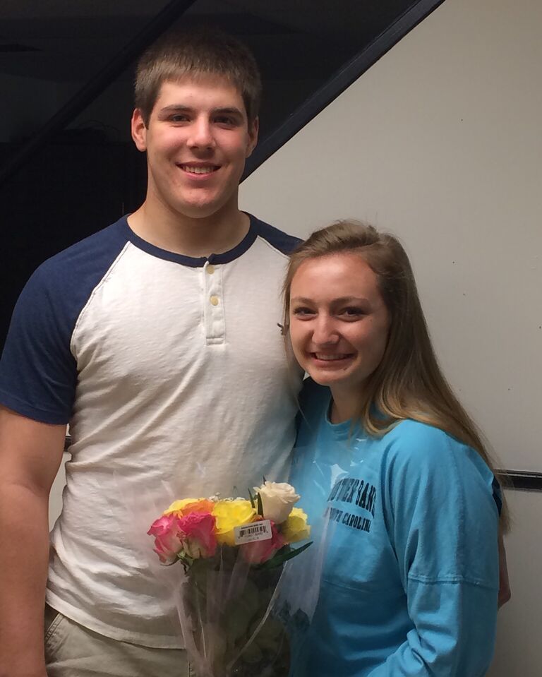 Our first real pic together! Charlie asking me to junior year prom :)