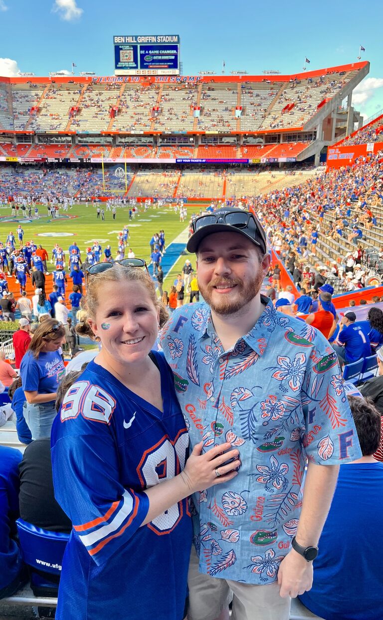 Amanda: I took Tyler to his first Gator game in Gainesville, and introduced him to my best friends. They're both bridesmaids, of course.