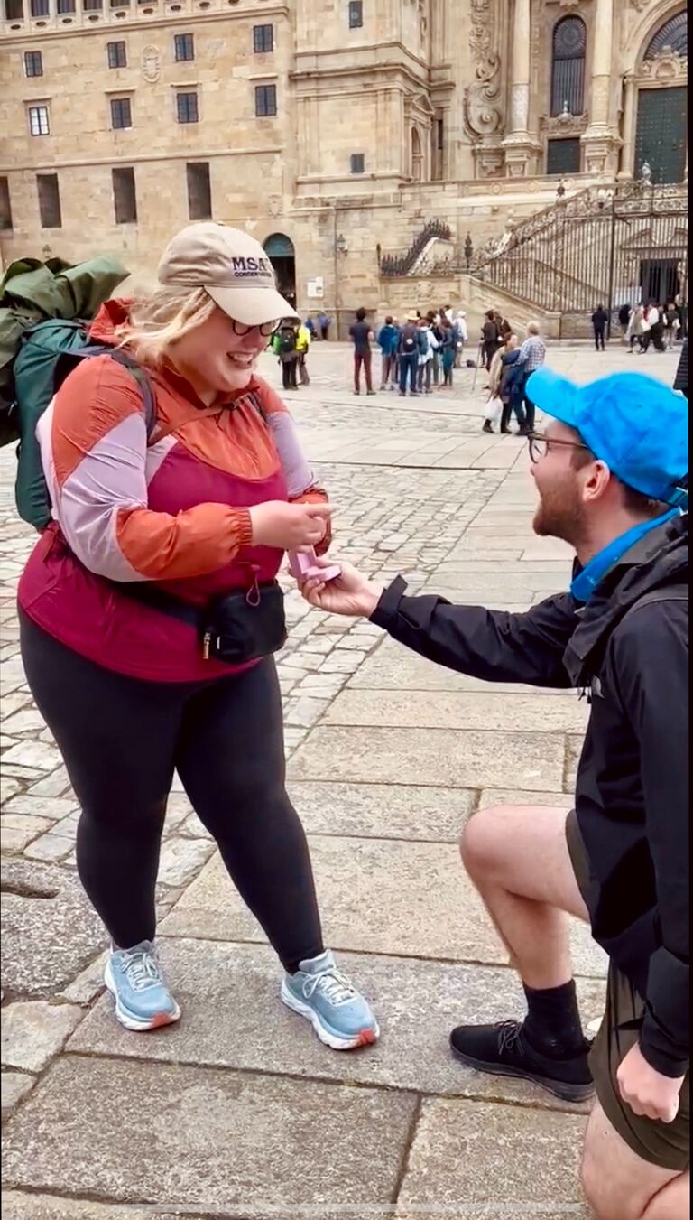 Everything that could go wrong did go wrong. Torrential rainpours, a vast underestimation of walking distance by their tour company, and an accidental glutening.

After over 100 km of walking, Chels and Ian finally reached Santiago de Compostela. Drenched and nervous, in the company of their new friends Mike and Judy from Hawaii, Ian got down on one knee and proposed. Chels happily agreed, excited to spend the rest of her life with her best friend. 