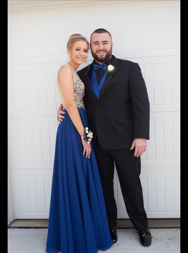 This was our junior prom, not sure Brody liked dressing up as much as I did... LOL 