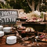 Crostini food station at wedding reception