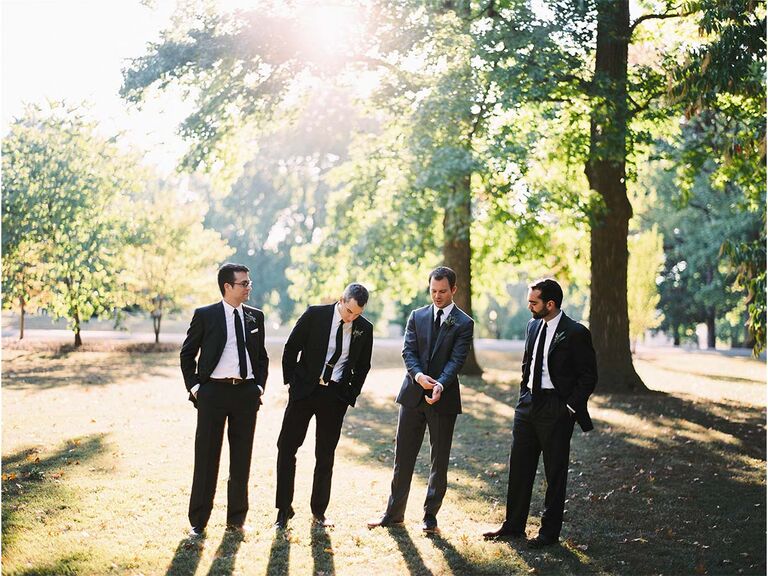 groom and groomsmen standing together casually
