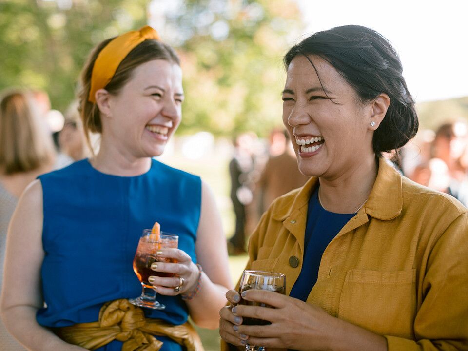 Sisters toasting during wedding shower.