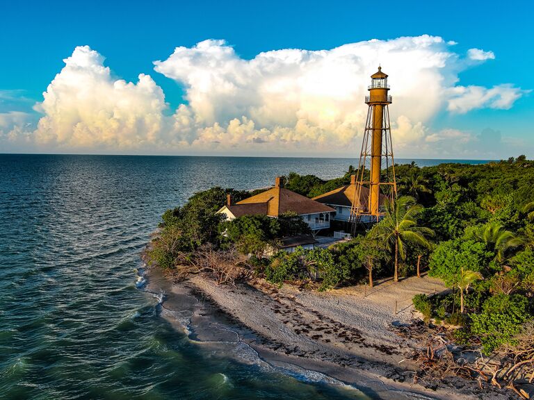Romantic sanibel island beach view with lighthouse