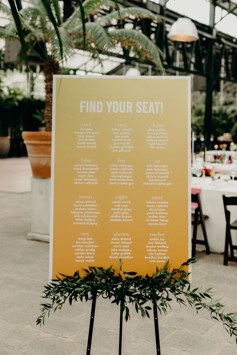 Simple yellow seating chart on easel
