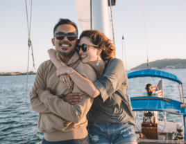 Couple on a boat cruise date in San Diego