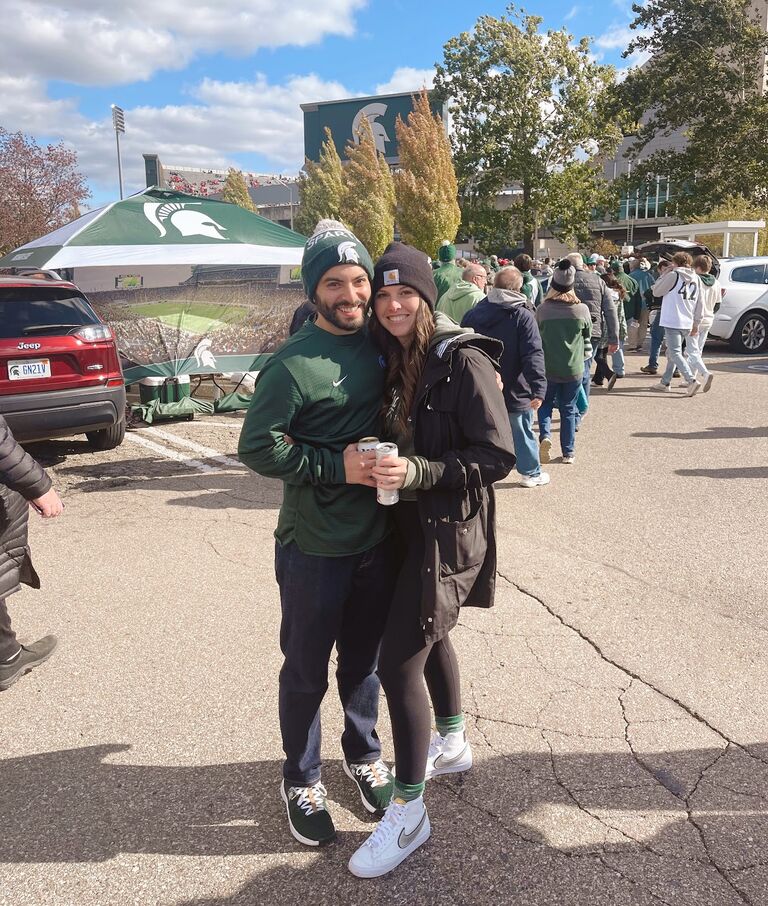 Celebrating 2 years together at another MSU game