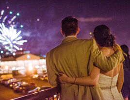 Couple looking at fireworks togther.