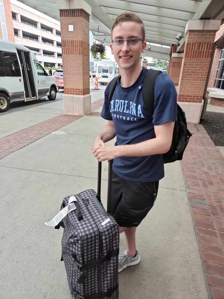 Matt getting off the plane for another trip to visit my family!