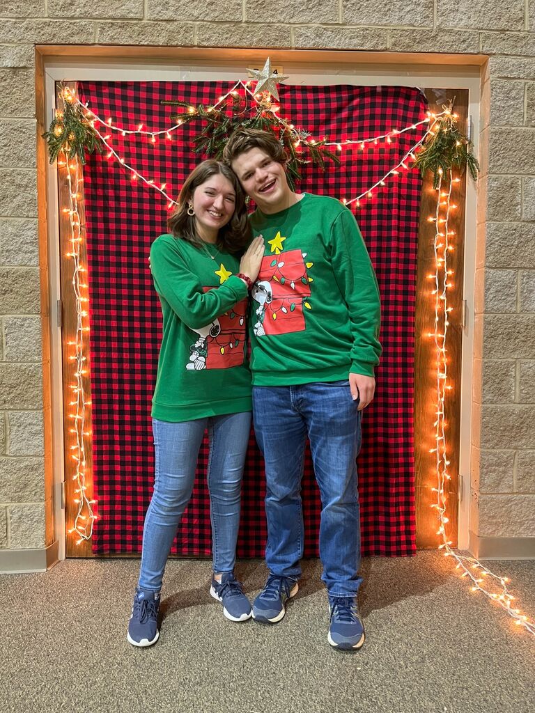 Taking an obligatory matching Christmas sweater picture.