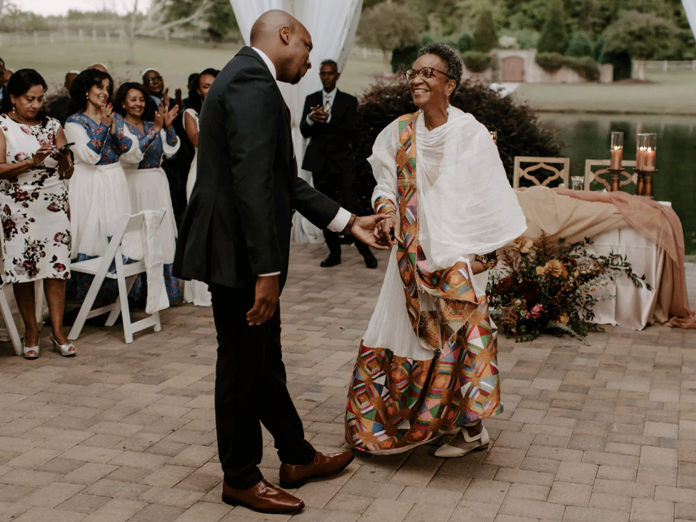 Groom on the dance floor with his mother on the wedding day.