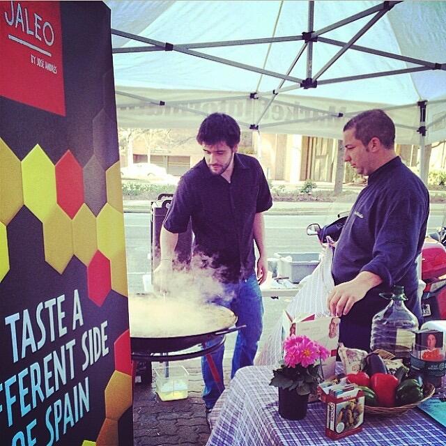 Early days of our relationship spent cooking and serving paella at work events. Romantic!