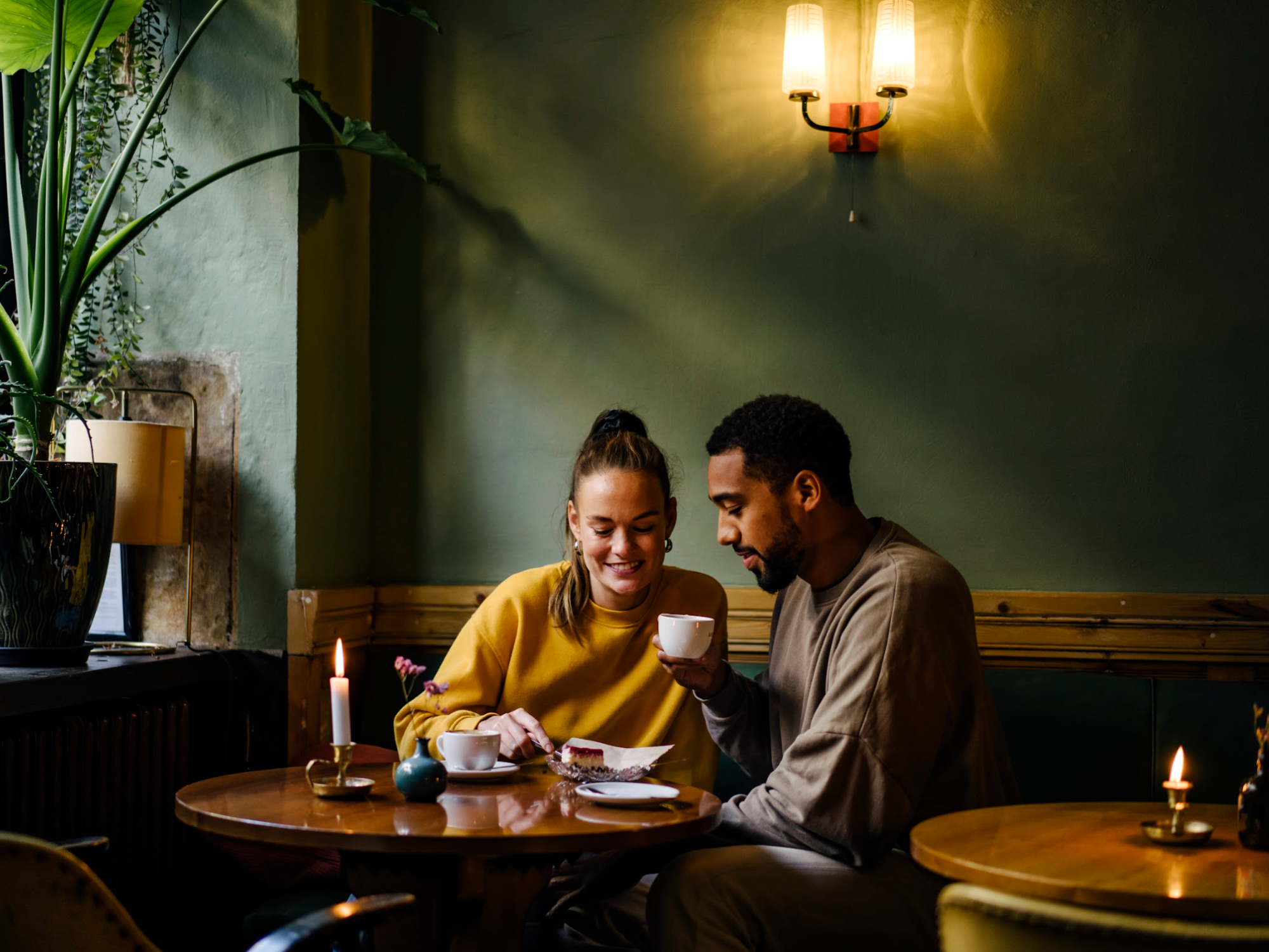 Couple on date having coffee in cafe