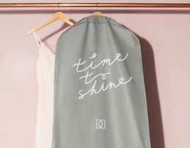 Gray bag with 'time to shine' in white script and David's Bridal logo