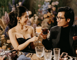 Bride and groom toasting with their signature cocktail.