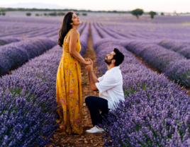 Man proposing to woman in lavender field