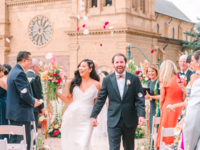 Bride and groom in front of church