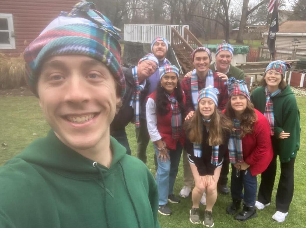 Christmas Eve with Paxson's wonderful family, featuring our matching hats and scarves.