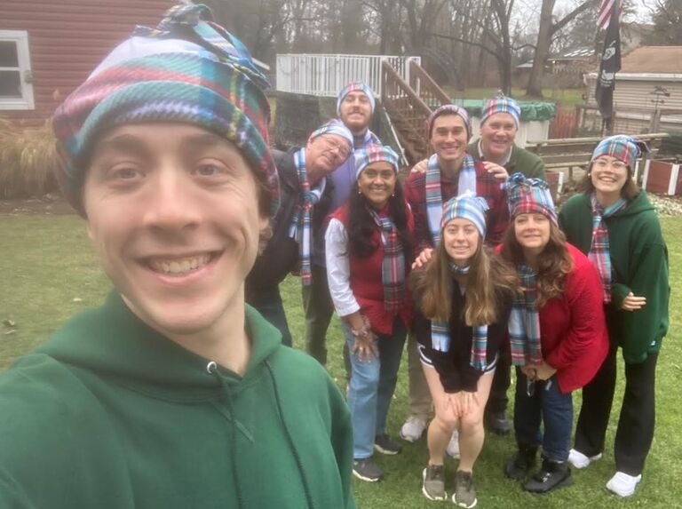 Christmas Eve with Paxson's wonderful family, featuring our matching hats and scarves.