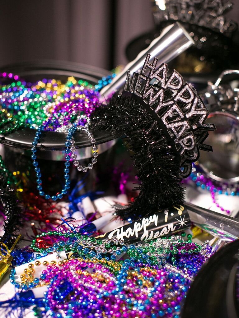 new year's eve headbands, noisemakers and colorful beads 