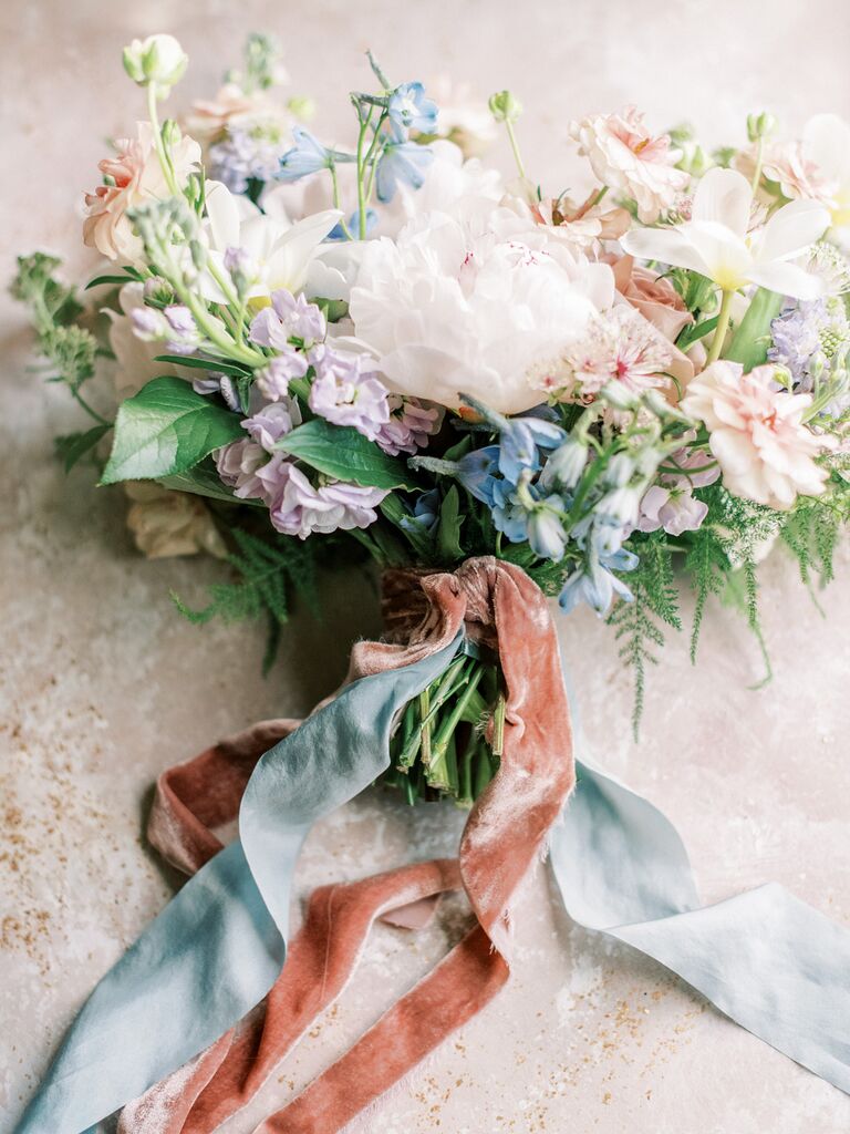 Wedding bouquet wrap made with velvet and satin ribbon in soft pink and blue
