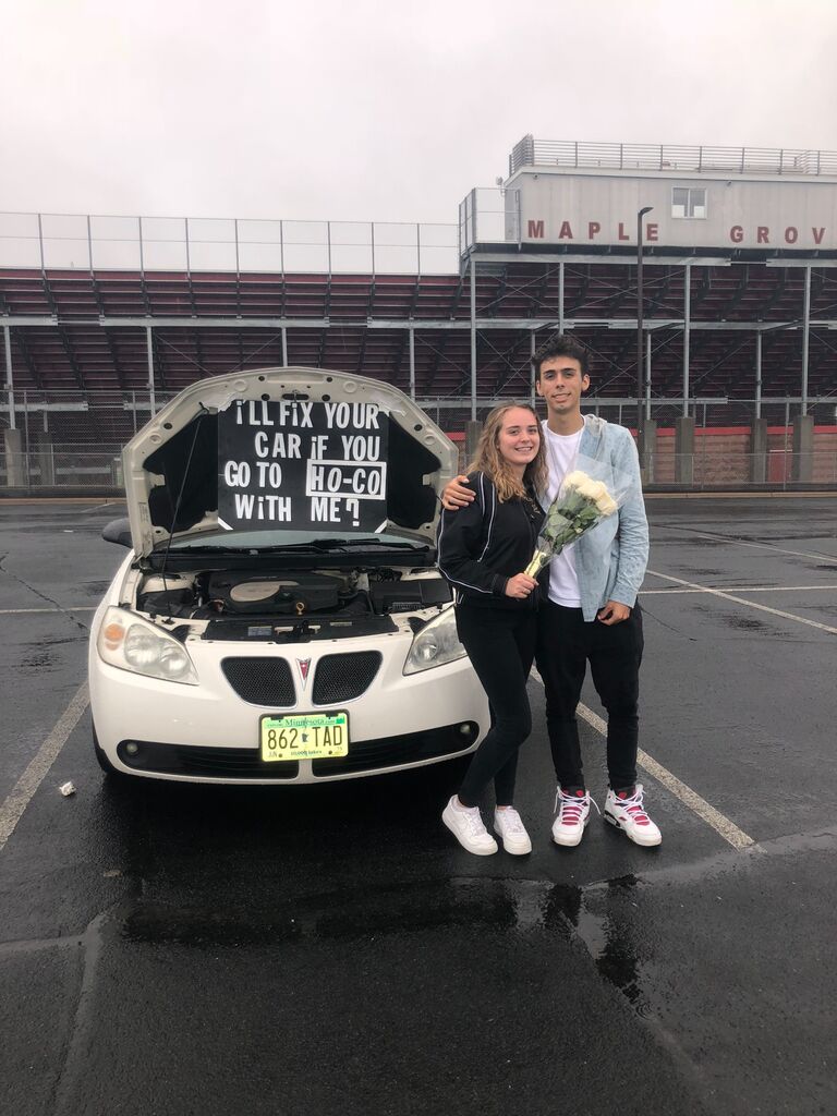The story behind this picture is, Nick unplugged my battery and had me open the hood to find out that we were going to Homecoming together!