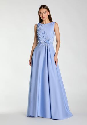 This sleeveless a-line gown boasts a boat neckline and an elegantly embellished bodice. Delicate floral details and a flowing silhouette make this gown a timeless and sophisticated choice for any special occasion.