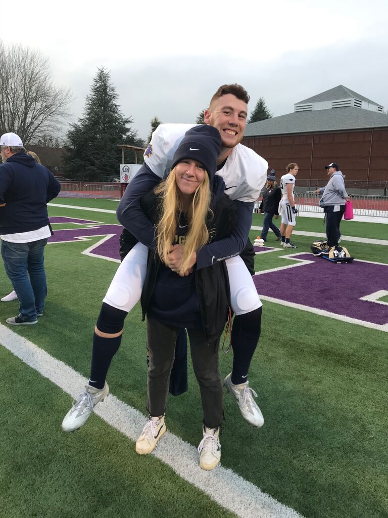 Sav supporting Jake at his football game against Linfield